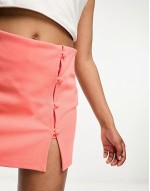 skort with side buttons in coral